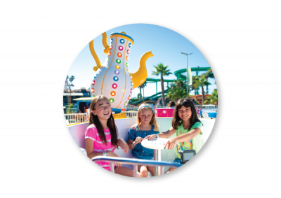 Three girls on teacup ride