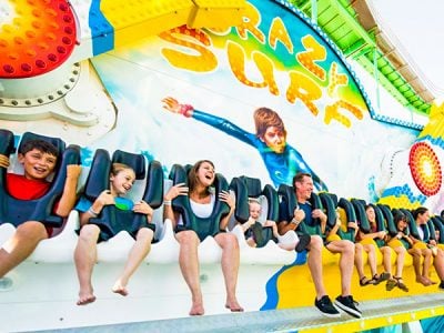 People enjoying Crazy Surf seaside park ride