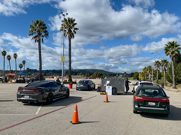 Cars entering a parking lot
