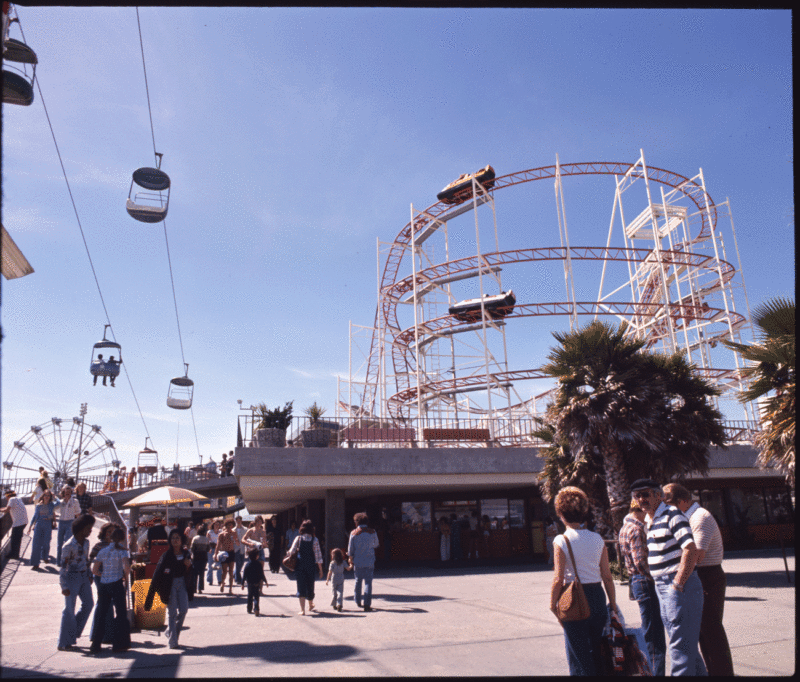The Jet Star coaster atop the coast deck with food concession and Bumper Cars below, late 1970s.